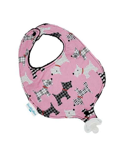 Absorbent drool bib with pacifier or teether attachment