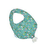 Absorbent drool bib with pacifier or teether attachment